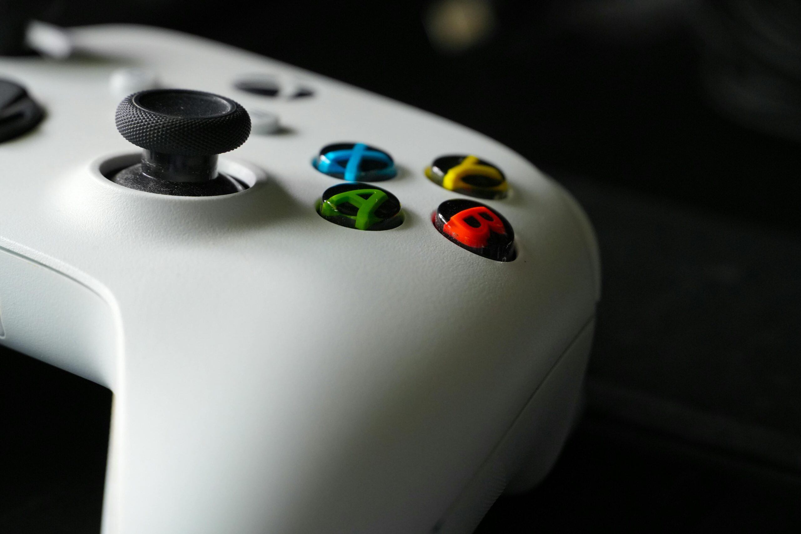Focus on Xbox controller buttons highlighting gaming technology and design.